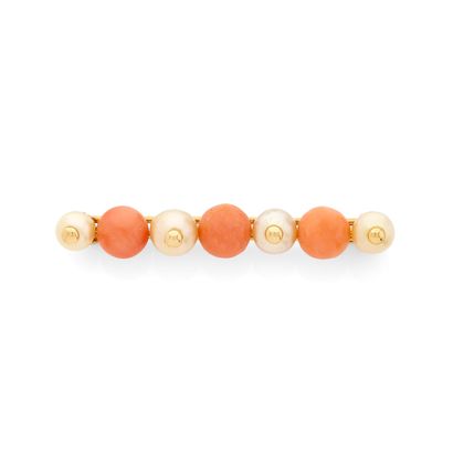 BARETTE BROOCH
featuring alternating cream-colored...