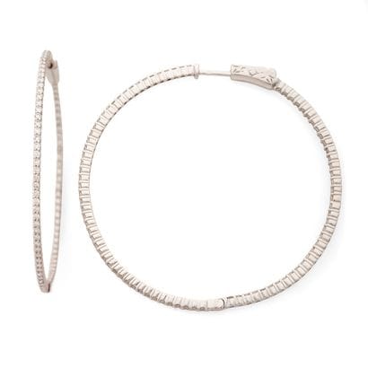 PAIRE DE CRÉOLES 
pavée de diamants ronds...