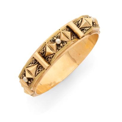 19TH CENTURY
BRACELET
featuring a geometric...