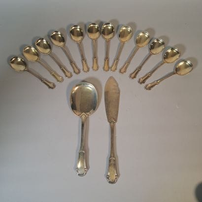 Set of vermeil COUVERTS including :
-12 ice-cream...