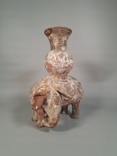 CHINA
Terracotta incense burner featuring...