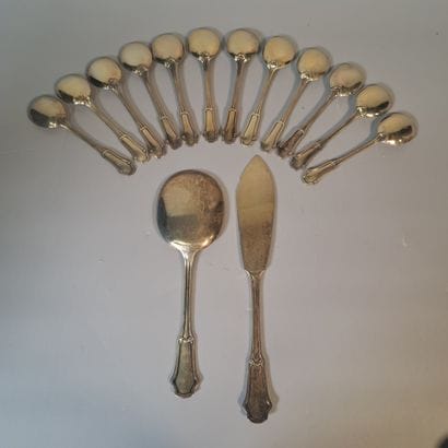 Set of vermeil COUVERTS including :
-12 ice-cream...
