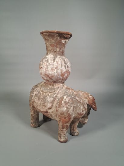 CHINA
Terracotta incense burner featuring...