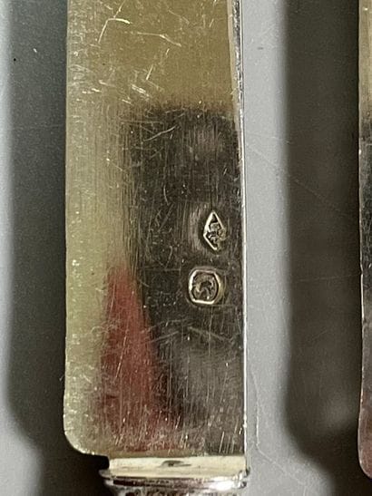 TWELVE 925° forged silver dessert knives...