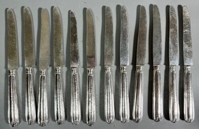 TWELVE 925° forged silver dessert knives...