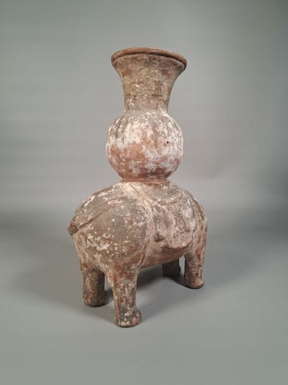 CHINA
Terracotta incense burner featuring...