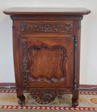 Moulded and carved wooden chest of drawers...