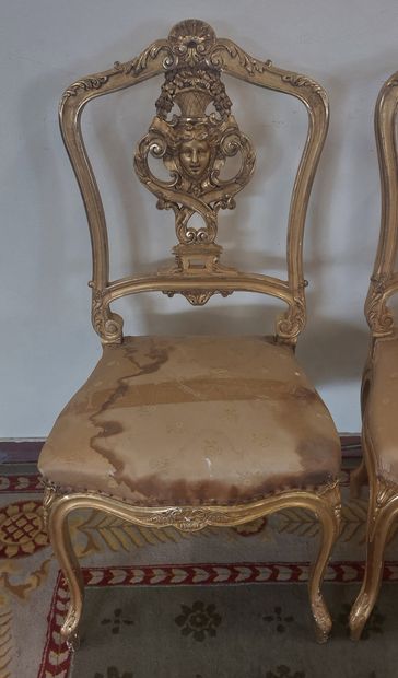 SUITE OF FOUR Gilded wood chairs with openwork...
