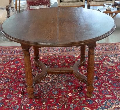 ROUNDED DINING TABLE in oak, braced legs

Accommodates...