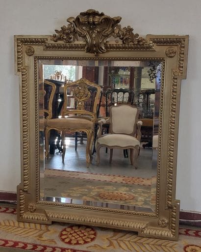 Wooden and gilded stucco MIRROR with pediment...