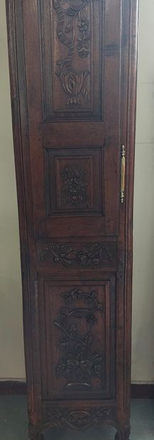 FLOOR CLOCK in moulded and carved oak, with...