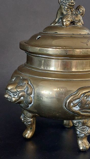 China, circa 1920, 

Gilded copper tripod...