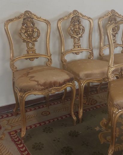 SUITE OF FOUR Gilded wood chairs with openwork...