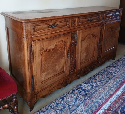 ENFILADE in moulded and carved walnut opening...