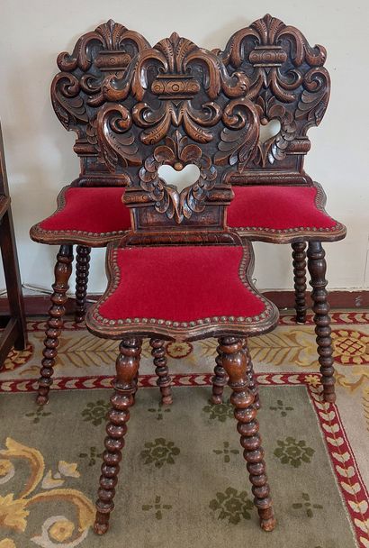 THREE moulded and carved wooden CHAIRS, velvet...