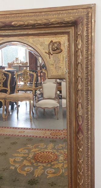 Wood and gilded stucco MIRROR decorated with...
