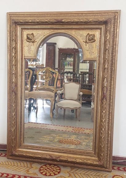 Wood and gilded stucco MIRROR decorated with...