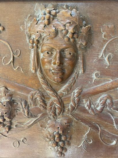 Carved wooden PANEL decorated with a figure's...