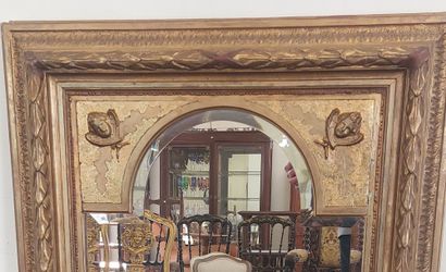 Wood and gilded stucco MIRROR decorated with...