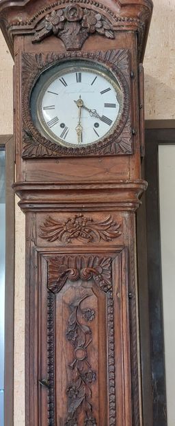 FLOOR CLOCK in moulded and carved oak decorated...