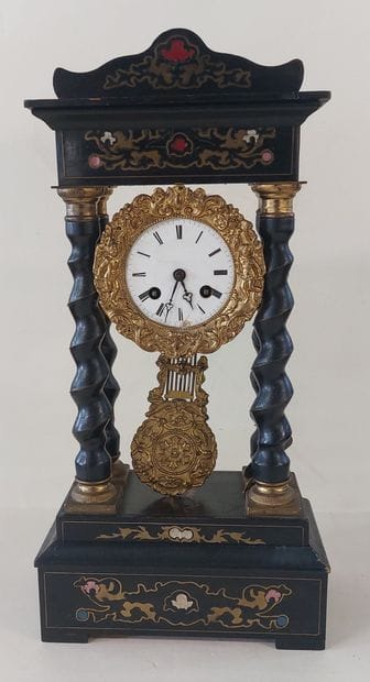 PENDULE in blackened wood, twisted columns,...