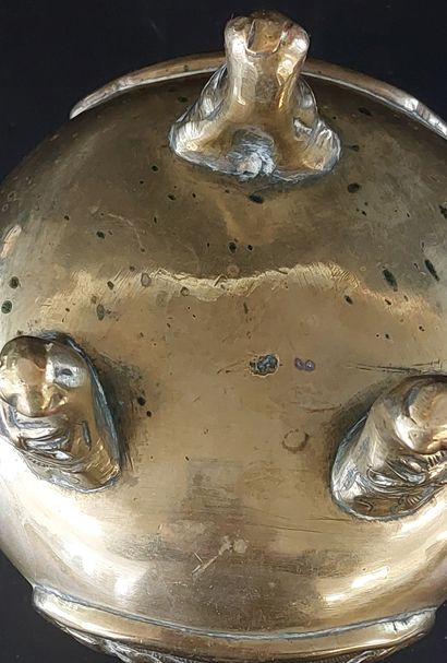 China, circa 1920, 

Gilded copper tripod...