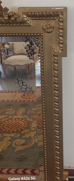 Wooden and gilded stucco MIRROR with pediment...