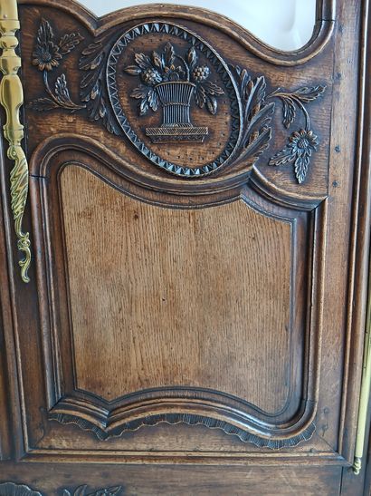 NORMANDE CABINET in moulded and carved oak,...