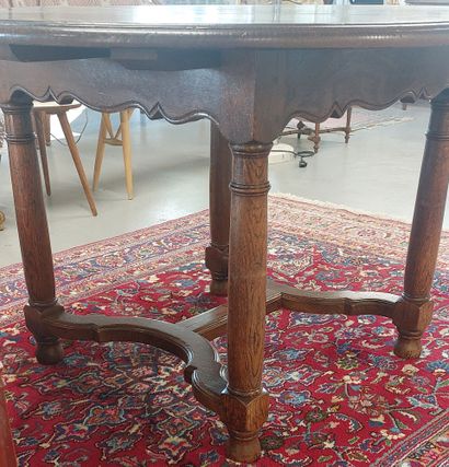 ROUNDED DINING TABLE in oak, braced legs

Accommodates...
