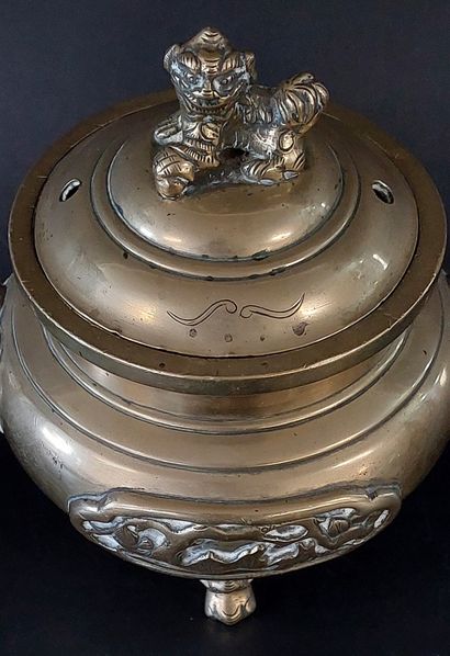 China, circa 1920, 

Gilded copper tripod...