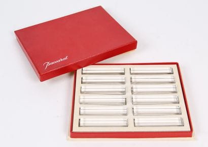 BACCARAT. 12 crystal knife holders in their...
