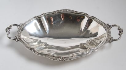 TWO ROUND DISHES
in silver-plated metal,...