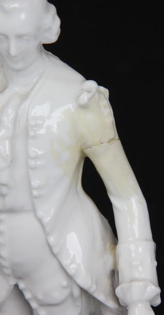PAIR OF WHITE PORCELAIN FIGURINES
depicting...