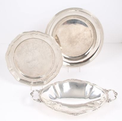 TWO ROUND DISHES
in silver-plated metal,...