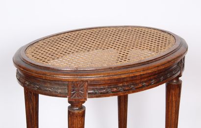 Petit tabouret de piano, de forme ovale,...