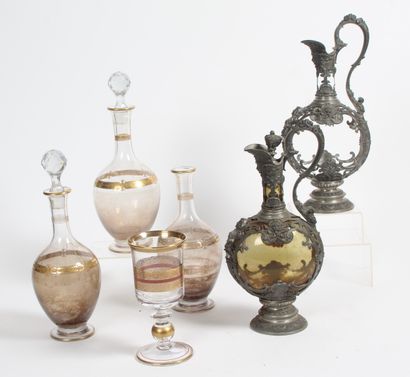 GLASSWARE LOT.
Three crystal decanters with...