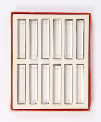 BACCARAT. 12 crystal knife holders in their...