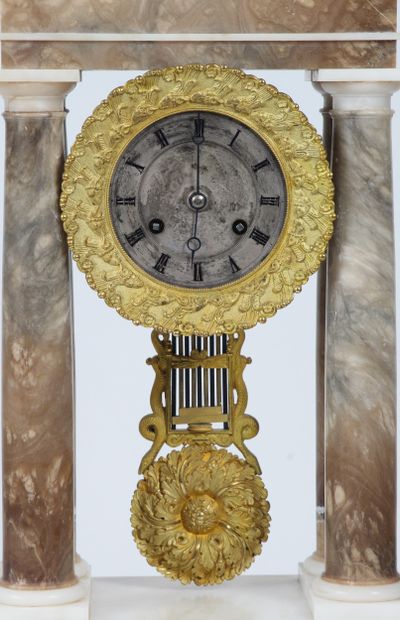 ALABASTER AND BROWN MARBLE CLOCK AND CANDLESTICK....