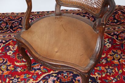 LOUIS XV armchair with caned back and seat....