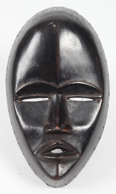 AFRICAN MASK, DAN style, made of charred...
