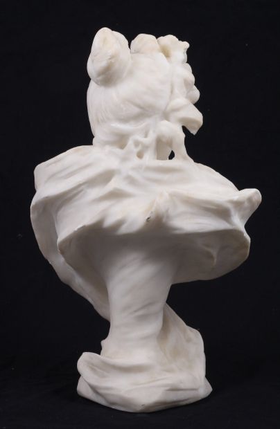 BUST OF A YOUNG WOMAN, facing right, in alabaster.
Circa...
