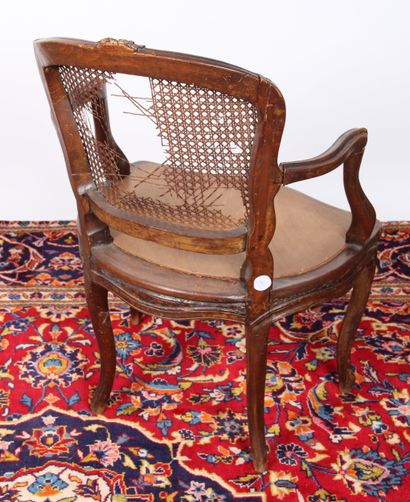 LOUIS XV armchair with caned back and seat....