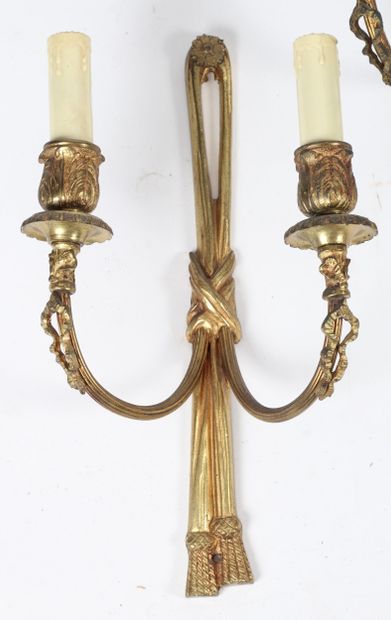 SET OF TWO PAIRS OF GILDED BRONZE WALL SCONCES.
Pair...