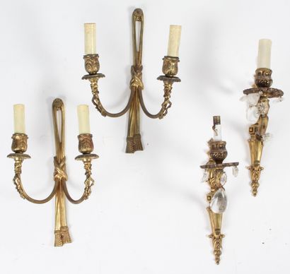 SET OF TWO PAIRS OF GILDED BRONZE WALL SCONCES.
Pair...