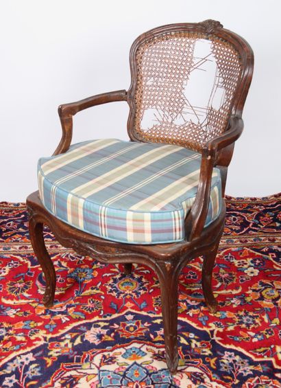 LOUIS XV armchair with caned back and seat....
