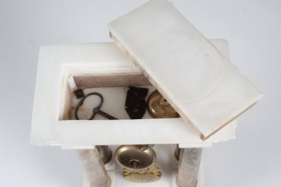 ALABASTER AND BROWN MARBLE CLOCK AND CANDLESTICK....