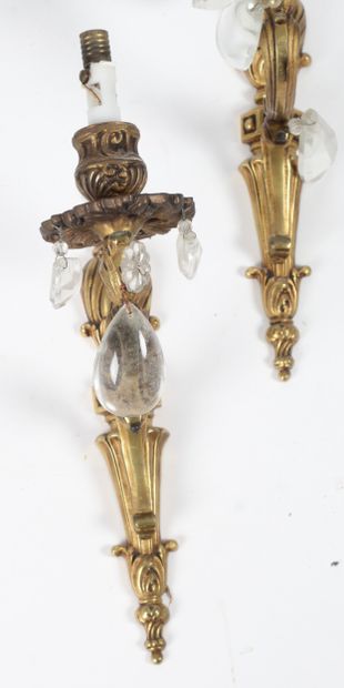 SET OF TWO PAIRS OF GILDED BRONZE WALL SCONCES.
Pair...