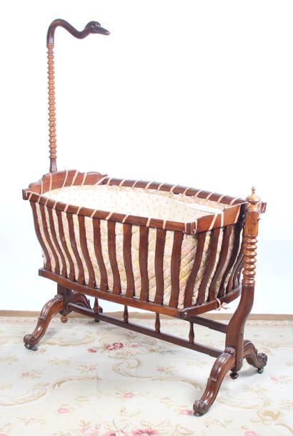 LARGE BORDELAIS BERCEAU in mahogany. Swan...