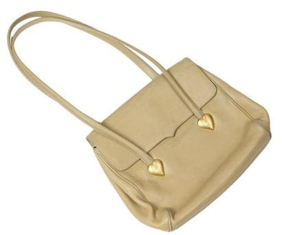 Yves Saint LAURENT
Sac à main en cuir beige...