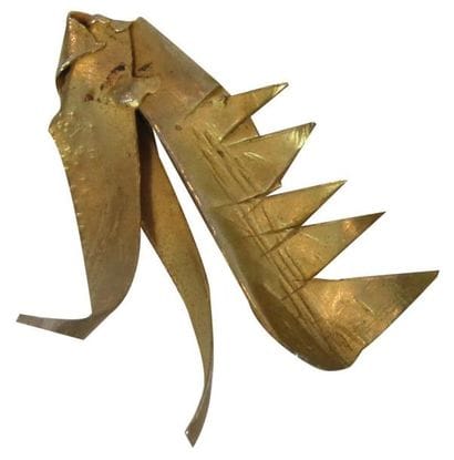 Gio COLUCCI (1892-1974)
Broche en métal doré...